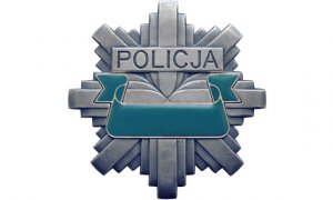 Na zdjęciu widoczna gwiazda policyjna koloru srebrnego z napisem Policja.