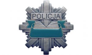 Na zdjęciu widoczna odznaka policyjna w kształcie gwiazdy.
